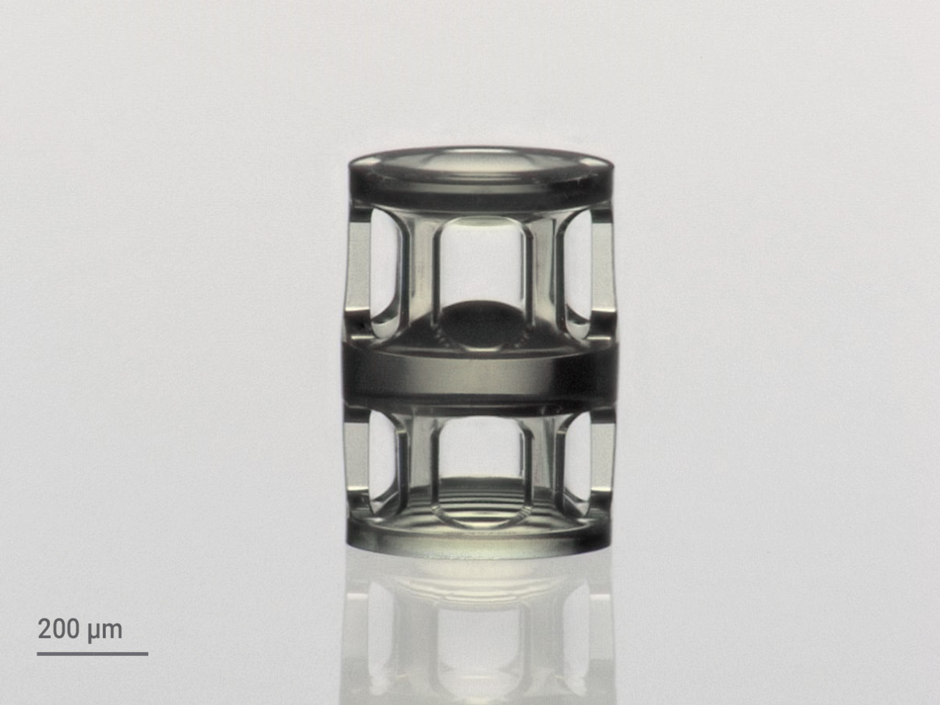 Compound lens system with three stacked aspherical lenses 3D-printed with IP-S