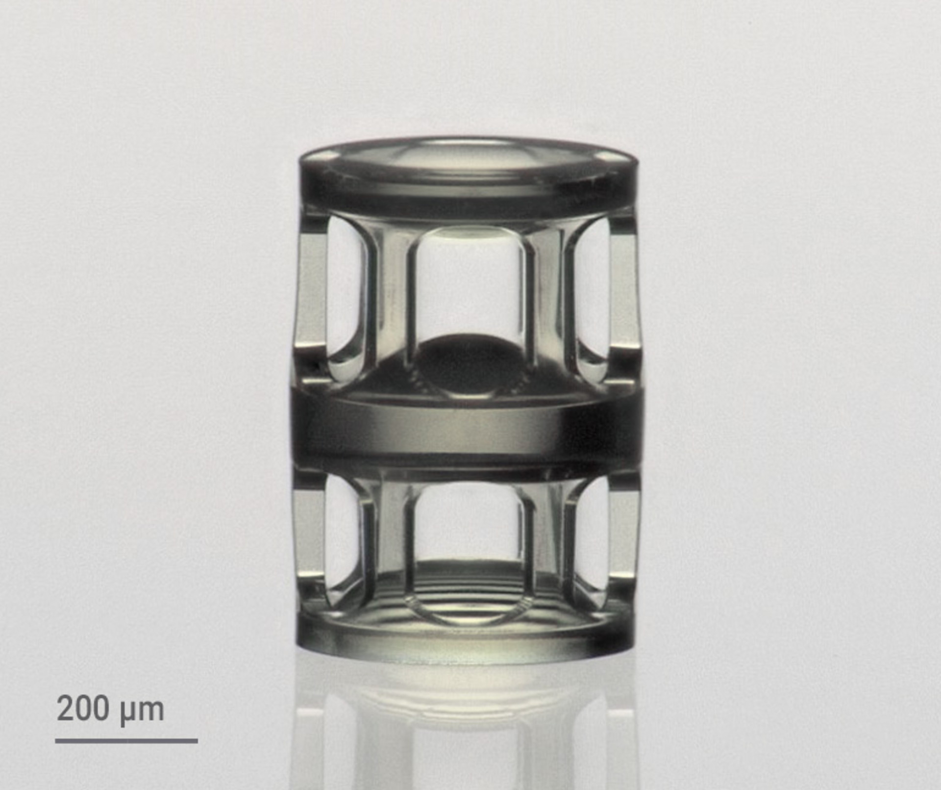 Compound lens system with three stacked aspherical lenses 3D-printed with IP-S